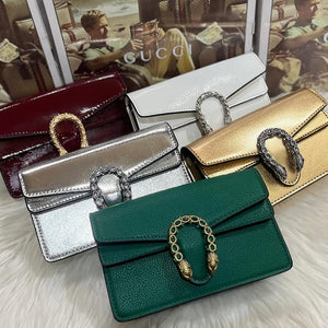 Guvcci mini dionysus cross body bag