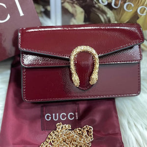 Guvcci mini dionysus cross body bag